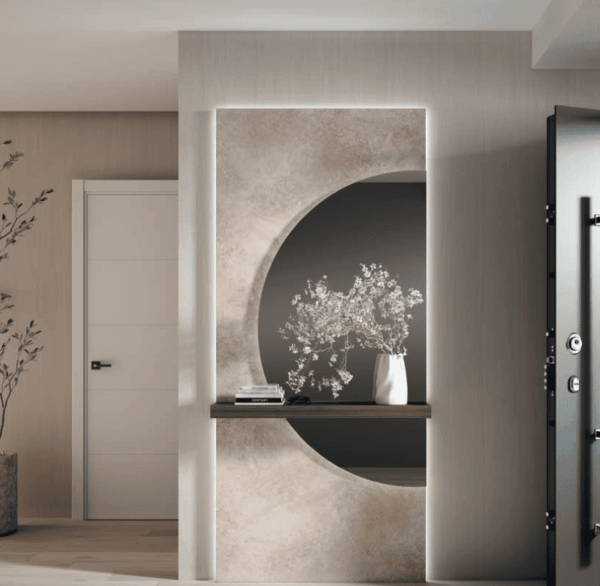 Recibidor moderno con panel decorativo circular y luz LED | Málaga